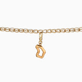 Charm artesanal con forma de mapa Muzo y baño de oro de 24k.
